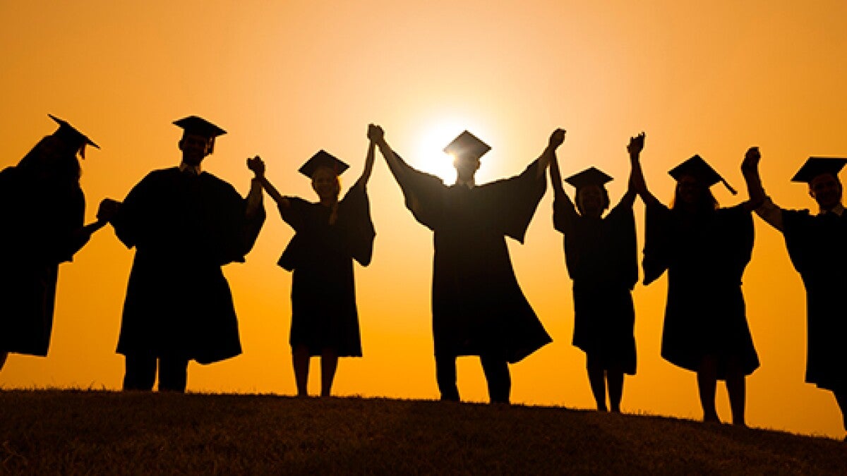 Graduation silhouette at sunset 